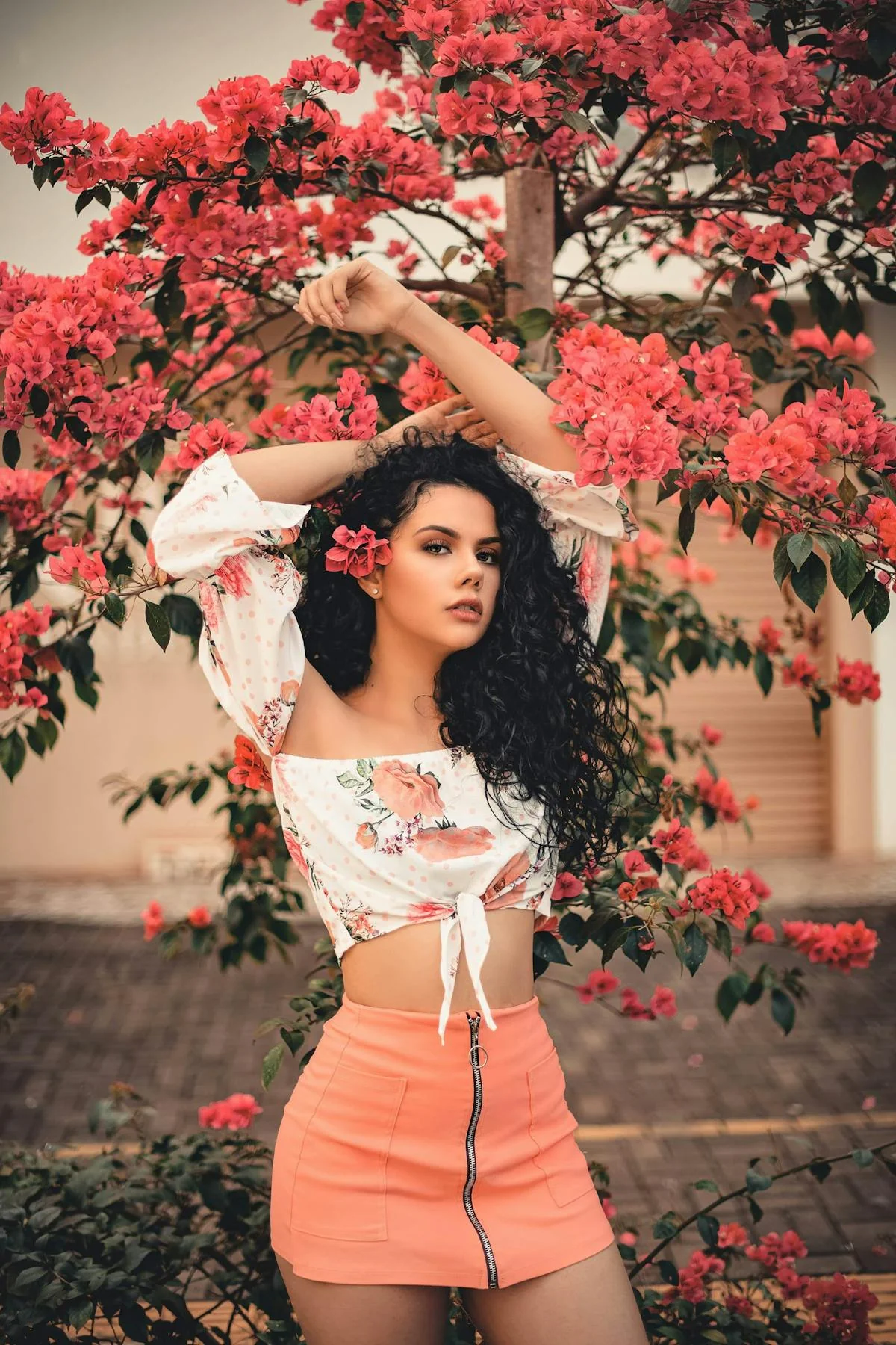 Brass pipes and steam vents in an industrial underground, casting warm light against dark walls