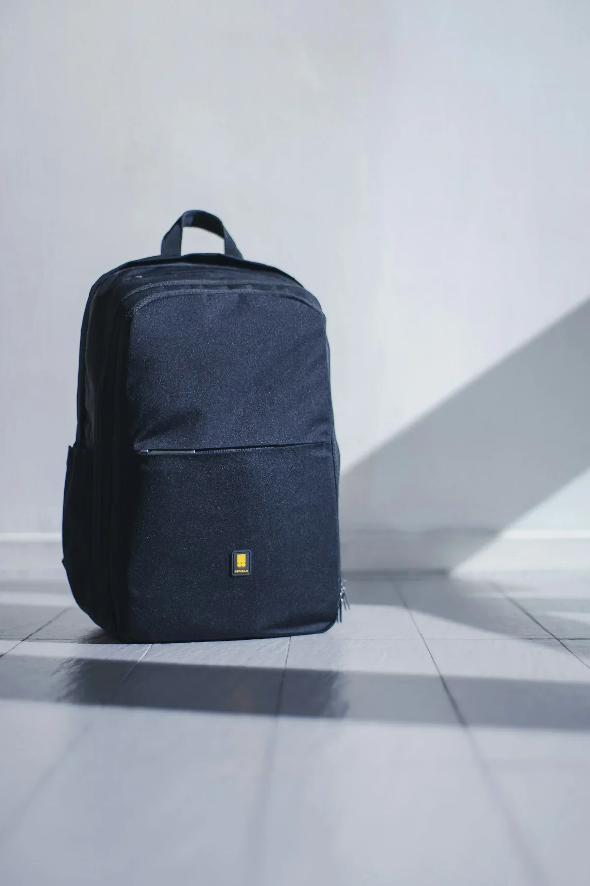 Leather travel bag with brass clasps, weathered and well-traveled