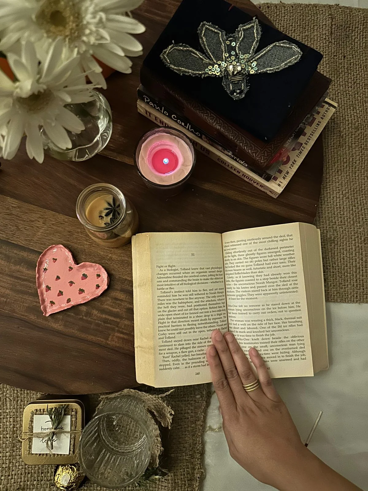 Cozy reading nook with candlelight — the quiet Saturday evening