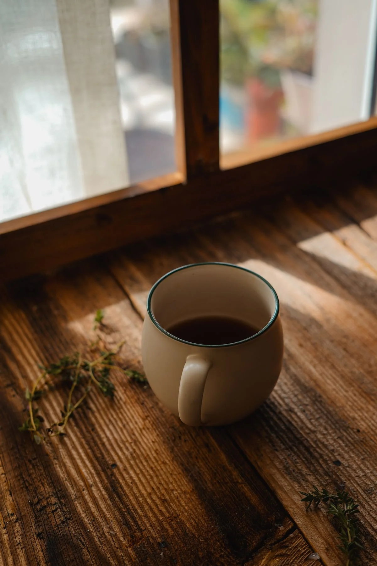 Cozy morning coffee by a sunlit window — the Saturday ritual