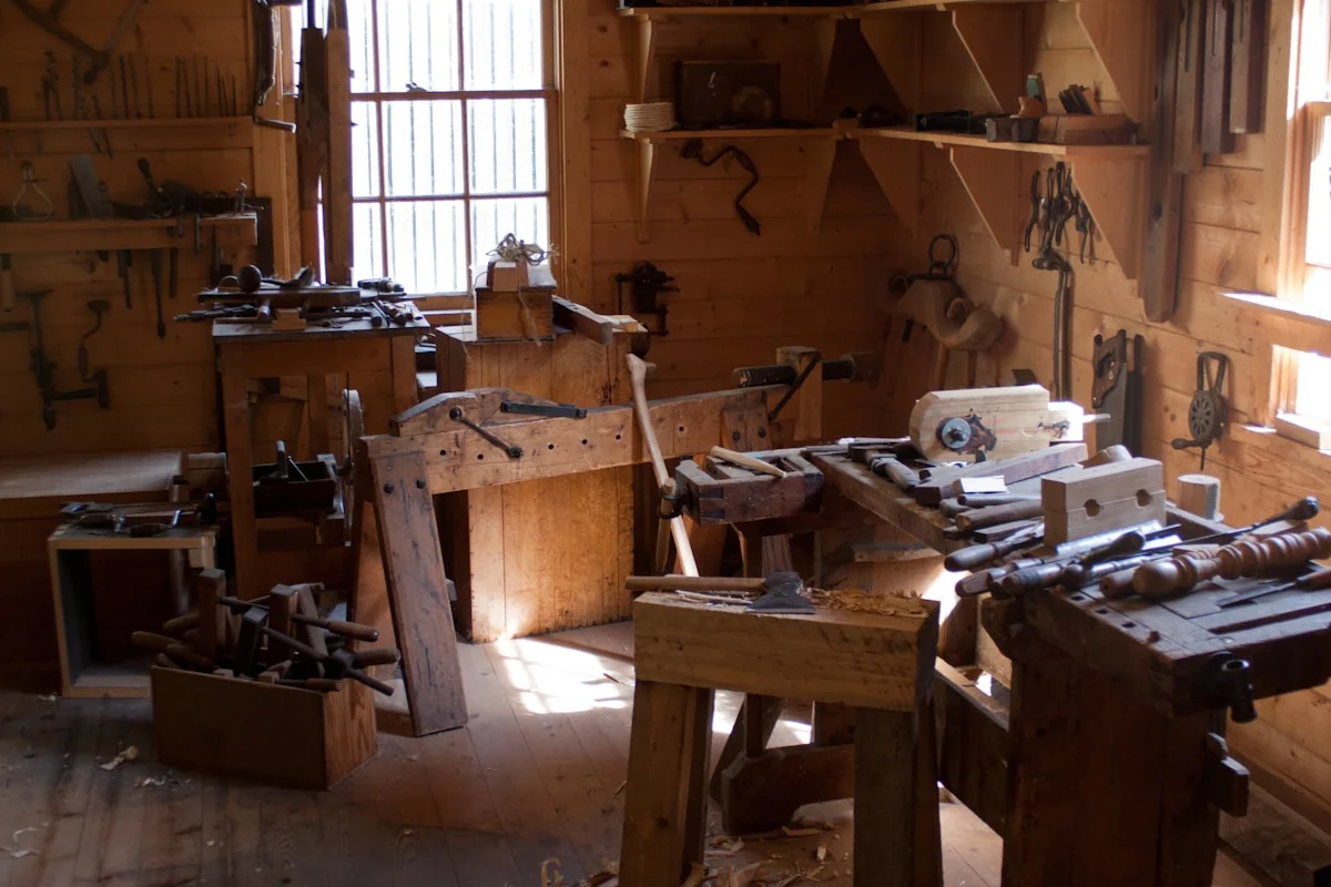 Worn workshop table with brass instruments showing beautiful patina